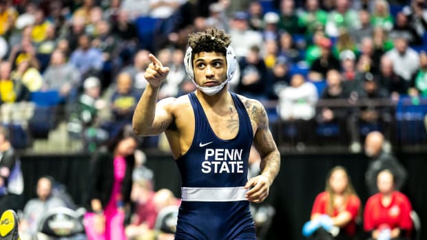 Penn State's Roman Bravo-Young reacts after winning his 133-pound semifinal bout at the NCAA Wrestling Championships.