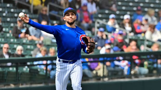 Mar 2, 2023; Mesa, Arizona, USA; Chicago Cubs second baseman Nick Madrigal (1) throws to first base in the first inning against the Oakland Athletics during a Spring Training game at Sloan Park. Mandatory Credit: Matt Kartozian-USA TODAY Sports