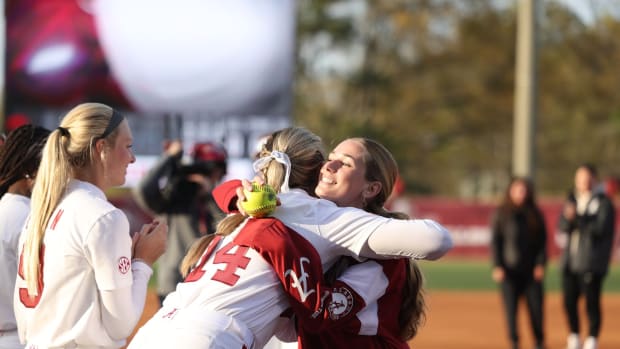 Felicia Knox throws out first pitch at Alabama softball vs Arkansas - March 20, 2023