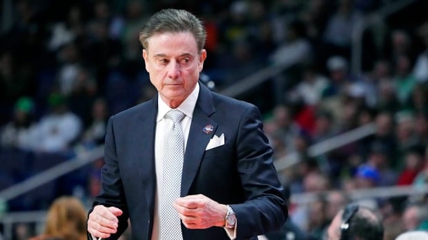 Iona coach Rick Pitino looks on against the UConn Huskies during the first half at MVP Arena.
