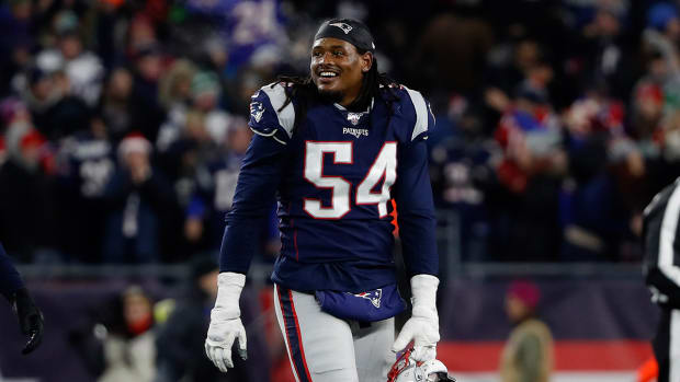 Patriots outside linebacker Dont’a Hightower (54) smiles as he leaves the field during the second half against the Bills at Gillette Stadium.