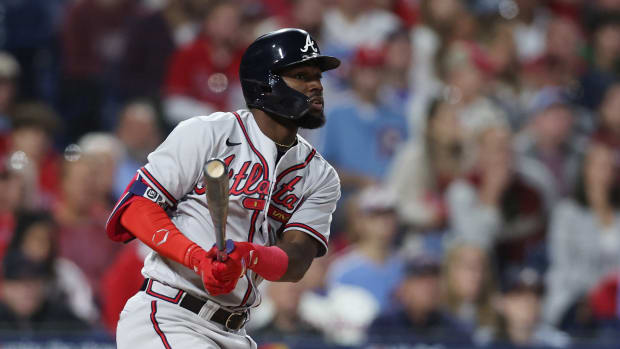 Oct 14, 2022; Philadelphia, Pennsylvania, USA; Atlanta Braves center fielder Michael Harris II hits a RBI single against the Philadelphia Phillies during the 6th inning in game three of the NLDS for the 2022 MLB Playoffs at Citizens Bank Park.