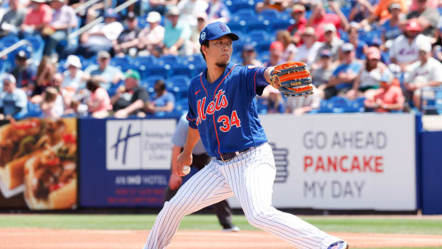 Mar 22, 2023; Port St. Lucie, Florida, USA; New York Mets starting pitcher Kodai Senga (34) throws a pitch during the first inning against the Houston Astros at Clover Park.