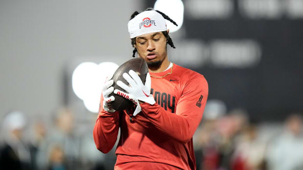Ohio State Buckeyes wide receiver Jaxon Smith-Njigba catches a pass from quarterback C.J. Stroud during Ohio State football s pro day at the Woody Hayes Athletic Center in Columbus on March 22, 2023.