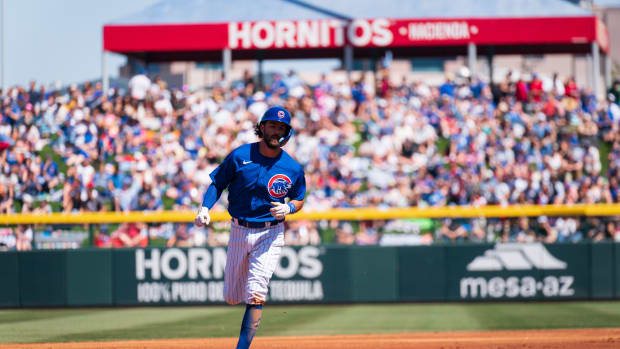 Mar 26, 2023; Mesa, Arizona, USA; Chicago Cubs infielder Dansby Swanson (7) round second base after hitting a home run in the third inning during a spring training game against the Kansas City Royals at Sloan Park. Mandatory Credit: Allan Henry-USA TODAY Sports