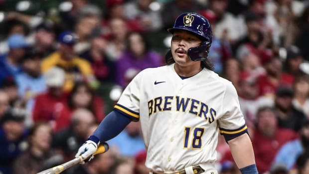 Sep 28, 2022; Milwaukee, Wisconsin, USA; Milwaukee Brewers designated hitter Keston Hiura (18) walks back to the dugout after striking out in the fourth inning against the St. Louis Cardinals at American Family Field.