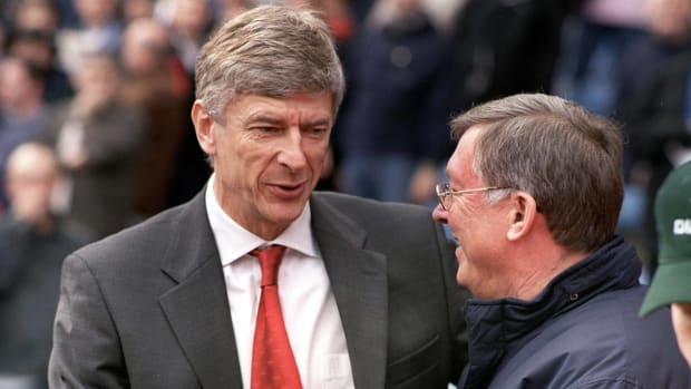 Arsene Wenger (left) pictured chatting with Sir Alex Ferguson during a game between Arsenal and Manchester United in April 2004