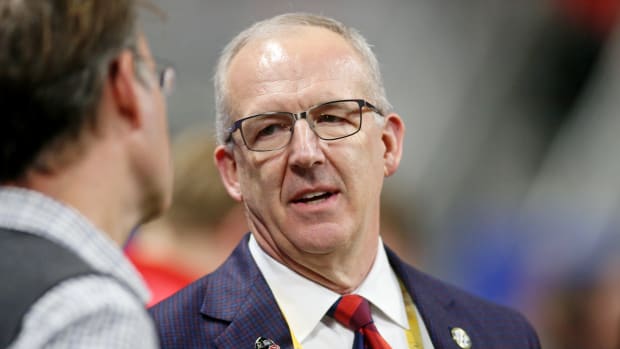 SEC commissioner Greg Sankey talks before the 2022 Peach Bowl between the Georgia Bulldogs and the Ohio State Buckeyes at Mercedes-Benz Stadium.