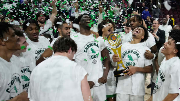 North Texas players celebrate after defeating UAB in an NCAA college basketball game in the final of the NIT, Thursday, March 30, 2023, in Las Vegas. (AP Photo/John Locher)