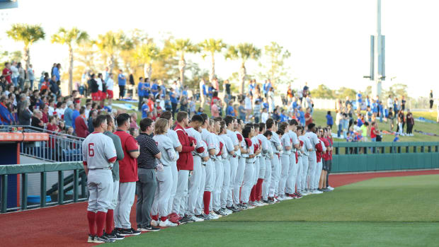 Alabama Baseball stands for the national anthem prior to its contest with the Florida Gators at Condron Family Ballpark in Gainesville, Fla.