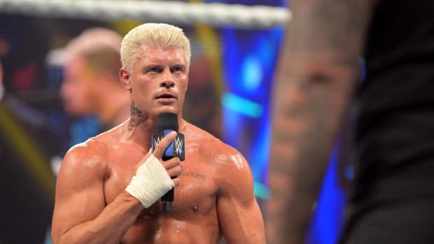 Cody Rhodes holds a microphone on SmackDown