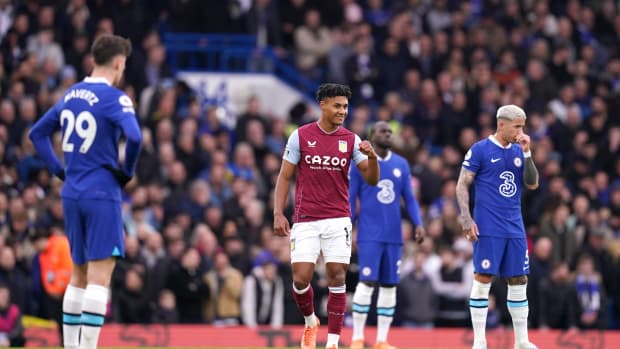 Ollie Watkins pictured (center) celebrating after scoring a goal for Aston Villa against Chelsea in April 2023