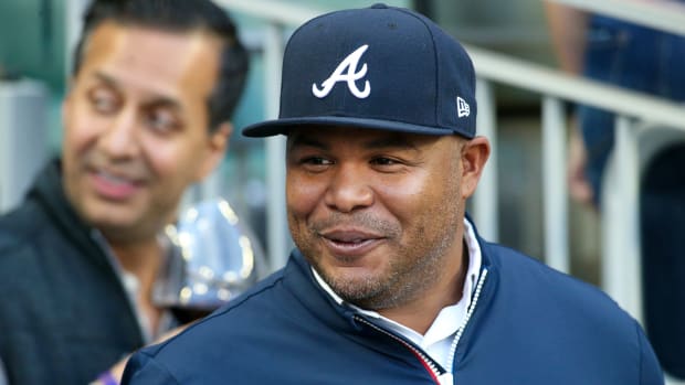 Apr 7, 2022; Atlanta, Georgia, USA; Former Atlanta Braves outfielder Andruw Jones looks on before the game on Opening Day against the Cincinnati Reds at Truist Park. Mandatory Credit: Brett Davis-USA TODAY Sports