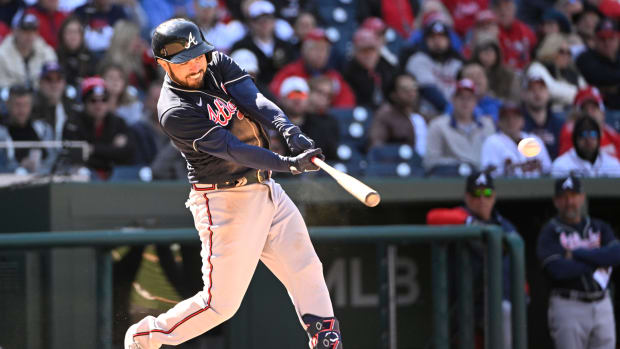 Mar 30, 2023; Washington, District of Columbia, USA; Atlanta Braves catcher Travis d'Arnaud (16) hits a two RBI double against the Washington Nationals during the ninth inning at Nationals Park.