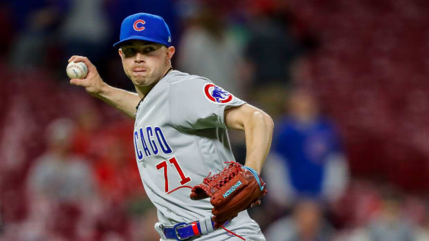 Apr 3, 2023; Cincinnati, Ohio, USA; Chicago Cubs starting pitcher Keegan Thompson (71) throws to first to get Cincinnati Reds shortstop Kevin Newman (not pictured) out in the seventh inning at Great American Ball Park. Mandatory Credit: Katie Stratman-USA TODAY Sports