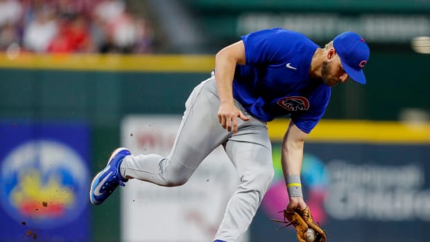 Apr 4, 2023; Cincinnati, Ohio, USA; Chicago Cubs third baseman Patrick Wisdom (16) grounds the ball hit by Cincinnati Reds second baseman Jonathan India (not pictured) in the fifth inning at Great American Ball Park. Mandatory Credit: Katie Stratman-USA TODAY Sports