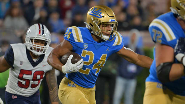 Nov 12, 2022; Pasadena, California, USA; UCLA Bruins running back Zach Charbonnet (24) runs the ball in the first half against the Arizona Wildcats at the Rose Bowl. Mandatory Credit: Jayne Kamin-Oncea-USA TODAY Sports