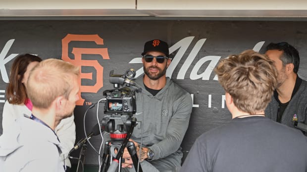 SF Giants manager Gabe Kapler talks to the media in the home team dugout before the game against the Arizona Diamondbacks. (2022)