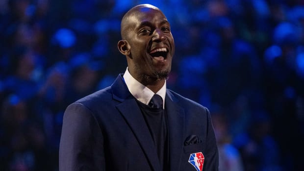 Timberwolves and Celtics great Kevin Garnett is honored for being selected to the NBA 75th Anniversary Team