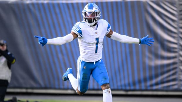 Lions cornerback Jeff Okudah (1) celebrates his interception for a touchdown in the fourth quarter of a game against the Bears.