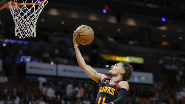 Apr 11, 2023; Miami, Florida, USA; Atlanta Hawks guard Trae Young (11) drives to the basket during the second quarter against the Miami Heat at Kaseya Center.