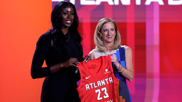 South Carolina’s Laeticia Amihere poses for a photo with commissioner Cathy Engelbert after being selected by the Atlanta Dream at the 2023 WNBA draft.