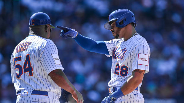 Apr 12, 2023; New York City, New York, USA; New York Mets center fielder Tommy Pham (28) reacts after hitting an RBI single during the seventh inning against the San Diego Padres at Citi Field.