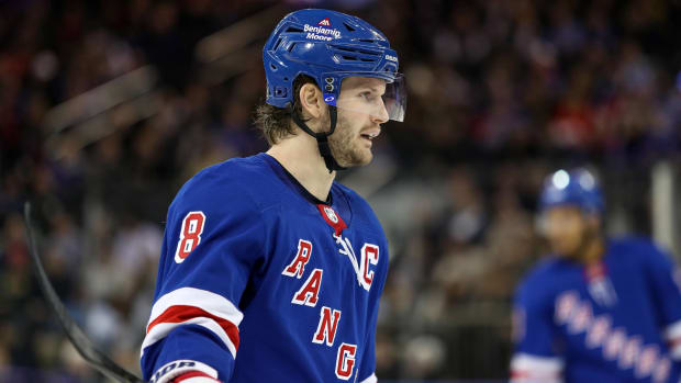 Rangers captain Jacob Trouba looks on during a game.