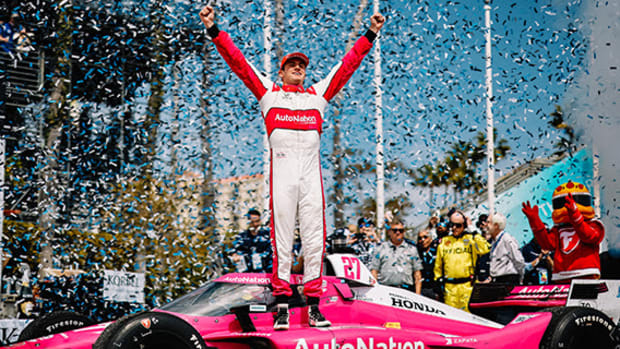 Kyle Kirkwood celebrates his first career IndyCar win Sunday in the Acura Grand Prix of Long Beach. Photo courtesy IndyCar.