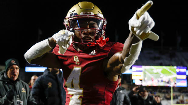 Nov 26, 2022; Chestnut Hill, Massachusetts, USA; Boston College Eagles wide receiver Zay Flowers (4) signals first down after a catch against the Syracuse Orange during the second half at Alumni Stadium.