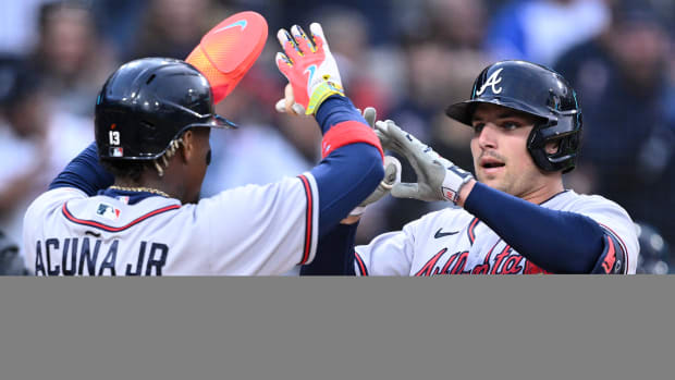 Apr 17, 2023; San Diego, California, USA; Atlanta Braves third baseman Austin Riley (right) is congratulated by right fielder Ronald Acuna (13) after hitting a two-run home run against the San Diego Padres during the first inning at Petco Park. Mandatory Credit: Orlando Ramirez-USA TODAY Sports