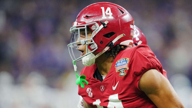 Dec 31, 2022; New Orleans, LA, USA; Alabama Crimson Tide defensive back Brian Branch (14) celebrates his interception against the Kansas State Wildcats during the second half in the 2022 Sugar Bowl at Caesars Superdome.