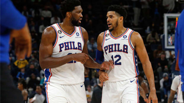 Dec 2, 2022; Memphis, Tennessee, USA; Philadelphia 76ers center Joel Embiid (left) and Philadelphia 76ers forward Tobias Harris (right) talks during a timeout during the second half against the Memphis Grizzlies at FedExForum. Mandatory Credit: Petre Thomas-USA TODAY Sports
