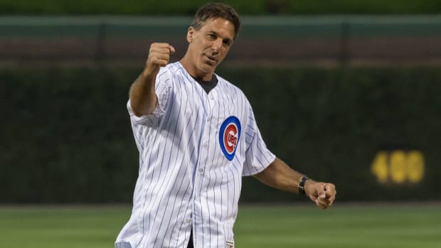 NHL hall of famer Chris Chelios throws the first pitch at a Chicago Cubs game.
