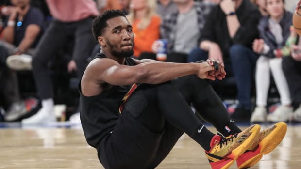 Cleveland Cavaliers guard Donovan Mitchell (45) sits on the court after being called for a foul during game four of the 2023 NBA playoffs against the New York Knicks at Madison Square Garden.