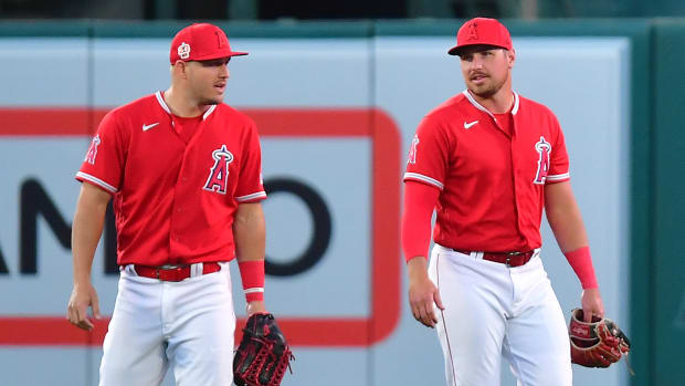 Mike Trout, left, and Hunter Renfroe in the outfield