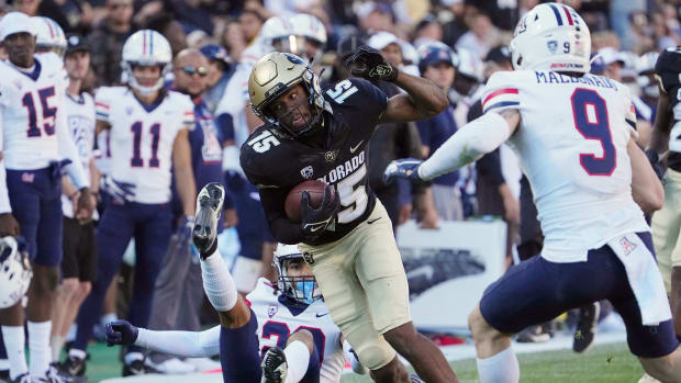 Oct 16, 2021; Boulder, Colorado, USA; Colorado Buffaloes wide receiver Montana Lemonious-Craig (15) carries the ball against the Arizona Wildcats in the fourth quarter at Folsom Field. Mandatory Credit: Ron Chenoy-USA TODAY Sports