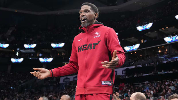 Heat forward Udonis Haslem gestures to an official.