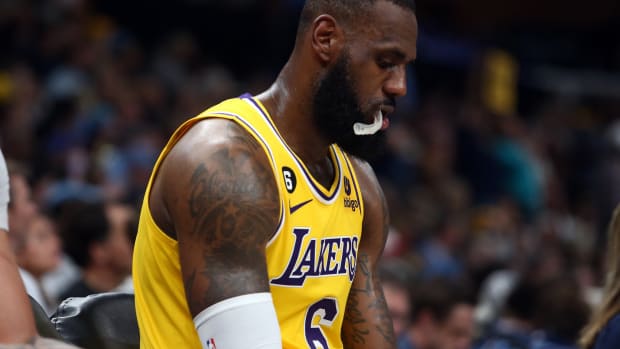 Los Angeles Lakers forward LeBron James (6) sits on the bench during a timeout during the second half against the Memphis Grizzlie
