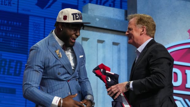 Alabama linebacker Will Anderson Jr. reacts with NFL commissioner Roger Goodell after being selected by the Houston Texans third overall in the first round of the 2023 NFL Draft at Union Station.