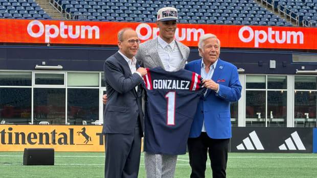 New England Patriots Jonathan Kraft, Christian Gonzalez, Robert Kraft