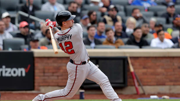 May 1, 2023; New York City, New York, USA; Atlanta Braves catcher Sean Murphy (12) follows through on a three run home run against the New York Mets during the seventh inning at Citi Field. Mandatory Credit: Brad Penner-USA TODAY Sports