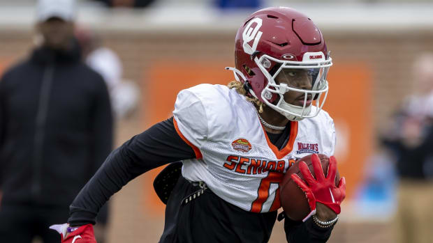 Feb 2, 2023; Mobile, AL, USA; American running back Eric Gray of Oklahoma (0) runs the ball during the third day of Senior Bowl week at Hancock Whitney Stadium in Mobile.