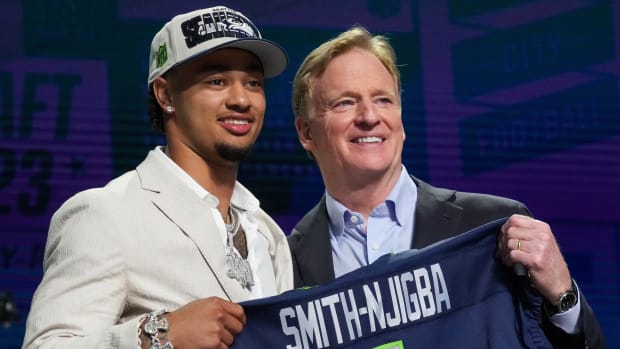 Seattle Seahawks first-round draft pick Jaxon Smith-Njigba with NFL commissioner Roger Goodell