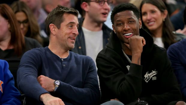 Jets' players Aaron Rodgers and Sauce Gardner at Madison Square Garden for the Knicks' 2023 NBA Eastern Conference semifinal Gane 2