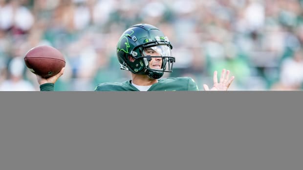 EAST LANSING, MICHIGAN - SEPTEMBER 10: Payton Thorne #10 of the Michigan State Spartans throws the ball against the Akron Zips during the second quarter at Spartan Stadium on September 10, 2022 in East Lansing, Michigan. (Photo by Nic Antaya/Getty Images)