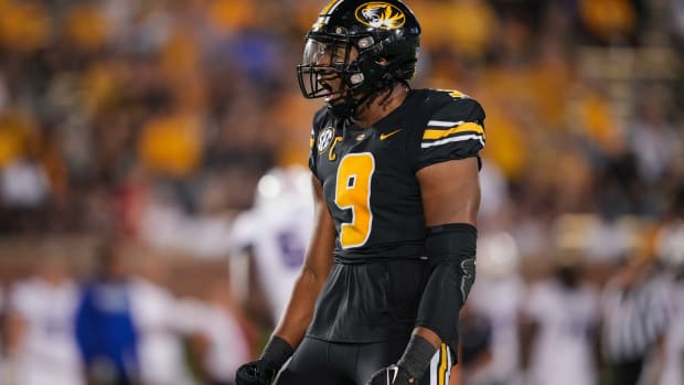 Sep 1, 2022; Columbia, Missouri, USA; Missouri Tigers defensive lineman Isaiah McGuire (9) celebrates after a sack against the Louisiana Tech Bulldogs during the second half at Faurot Field at Memorial Stadium. Mandatory Credit: Jay Biggerstaff-USA TODAY Sports