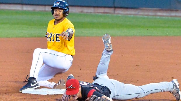 Erie SeaWolves baserunner Dane Myers slides into second base ahead of a throw to Richmond Flying Squirrels shortstop Tyler Fitzgerald. (2022)