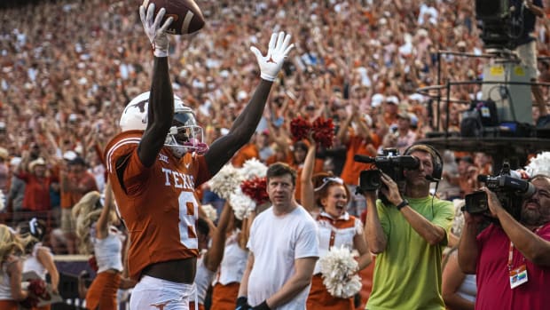Texas wide receiver Xavier Worthy (8) celebrates a touchdown that put Texas up 7-0 over West Virginia during the game at Royal Memorial Stadium in Austin, Texas on Oct. 1, 2022. Xxx Austex10 Jpg Usa Tx
