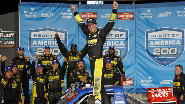 Grant Enfinger celebrates in victory lane after winning Saturday's NASCAR Craftsman Truck Series Heart of America 200 at Kansas Speedway. (Photo by Sean Gardner/Getty Images)